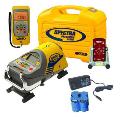Spectra Precision tool set with various instruments and accessories on a white background